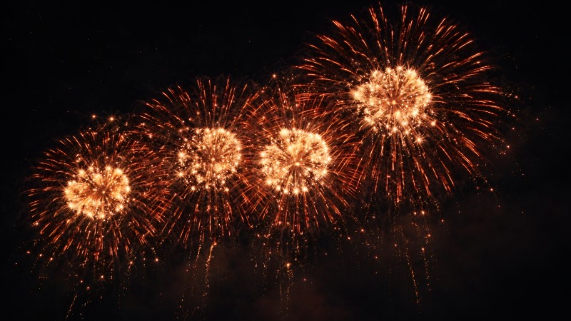 Beautiful fireworks over serene water